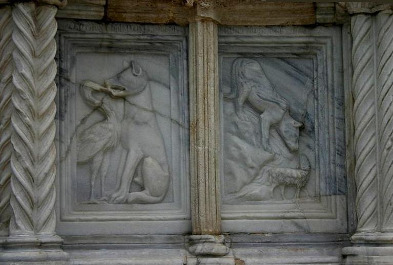A detail of the 13th-century Fontana Maggiore in Perugia with the fables of The Wolf and the Crane and The Wolf and the Lamb