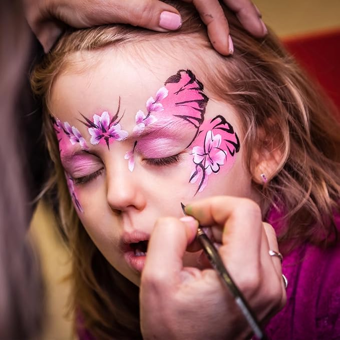 face painting a child