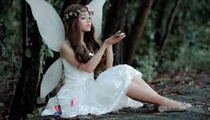 a white fairy in a white dress