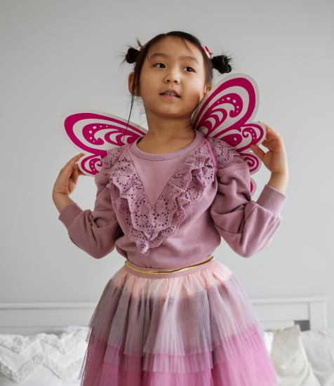 little girl with fairy wings
